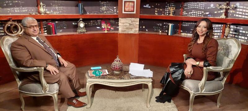 د. على مطاوع والمذيعة نانسى إبراهيم